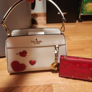 kate spade white top-handle bag with red heart accents